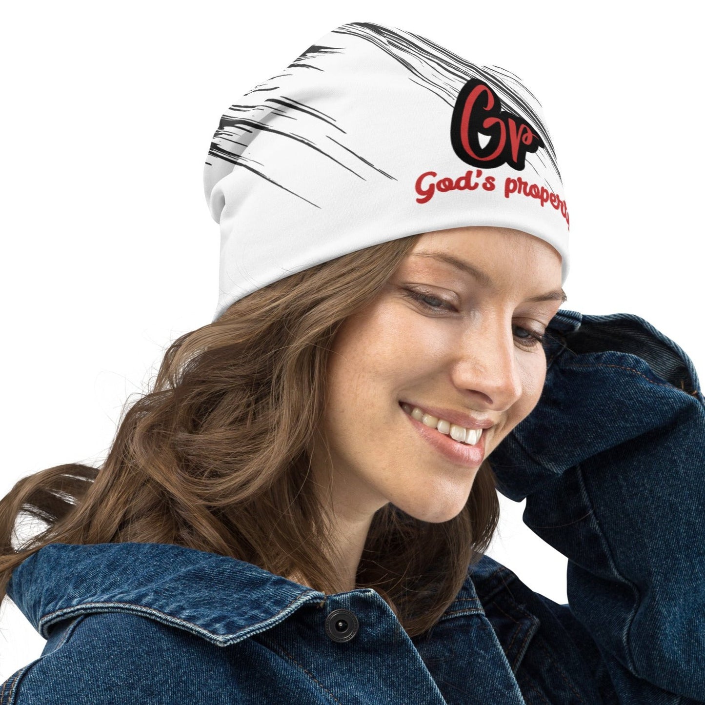 Right of white and black print unisex beanie with text saying 'GP, God's property' in red