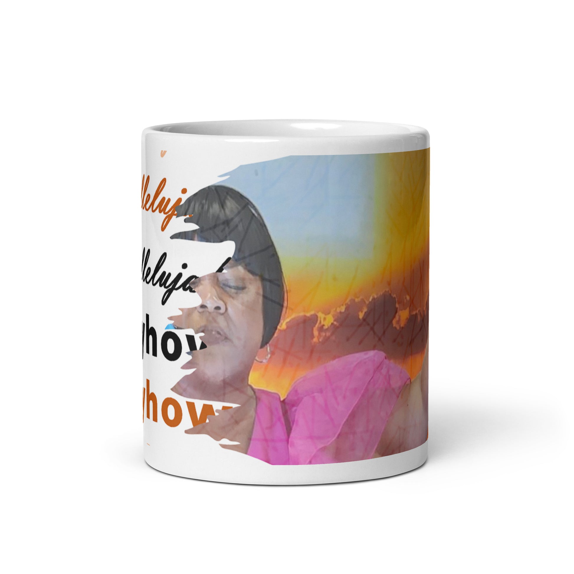 Front view of 11 oz white mug with orange, pink, and brown image of a black woman with text on left side of image saying 'hallelujah anyhow'