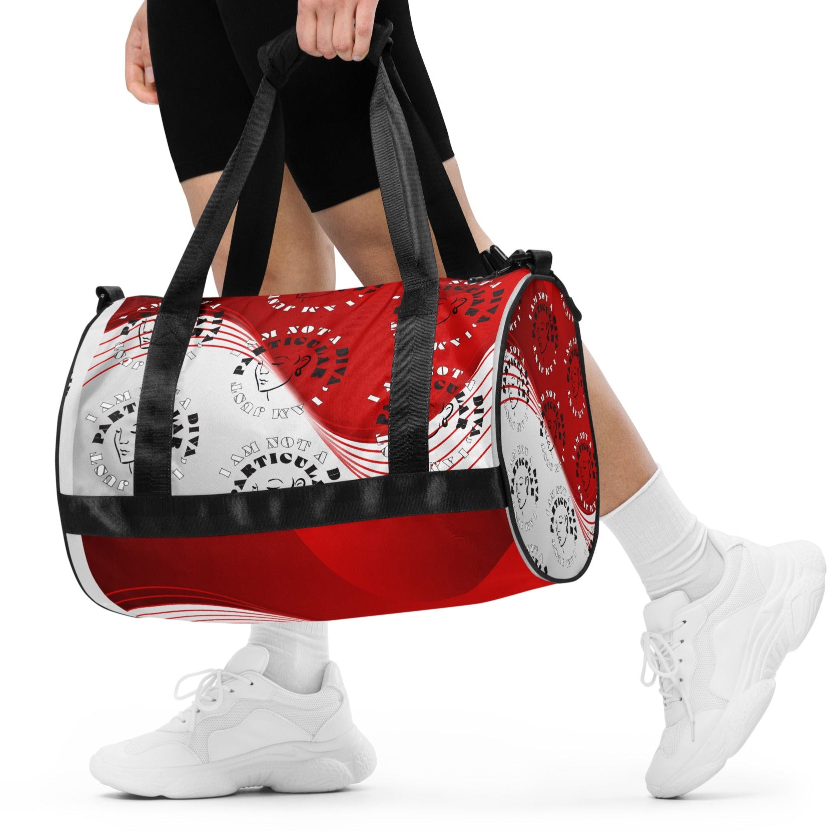 Front of red and white print gym bag with icons of woman's face and text saying 'I am not a diva, I am just particular' being carried by a female
