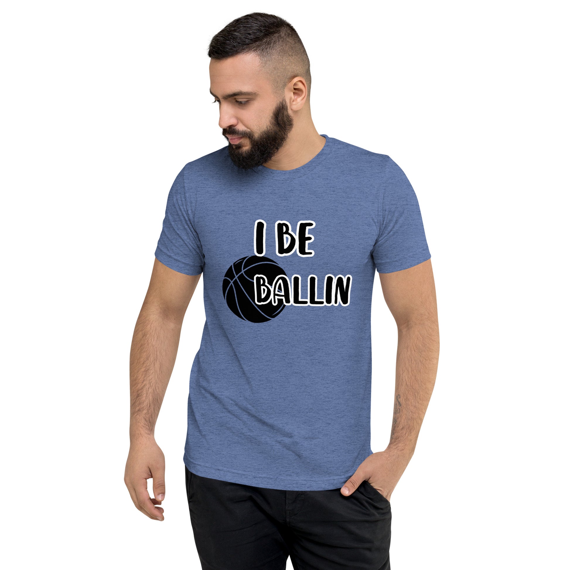 Front of blue t-shirt with image of black basket and black and white text saying 'I Be Ballin'