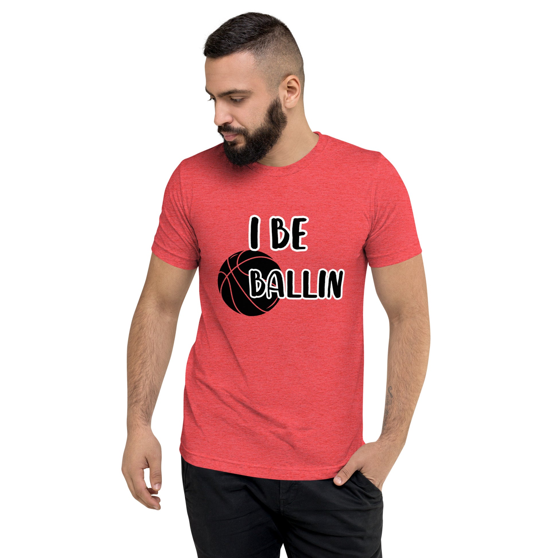 Front of red t-shirt with image of black basket and black and white text saying 'I Be Ballin'