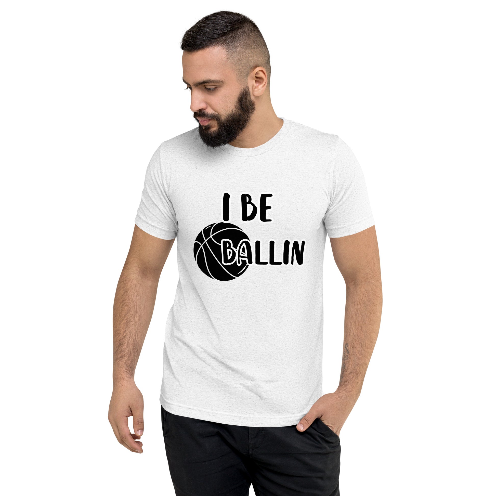 Front of white t-shirt with image of black basket and black and white text saying 'I Be Ballin'