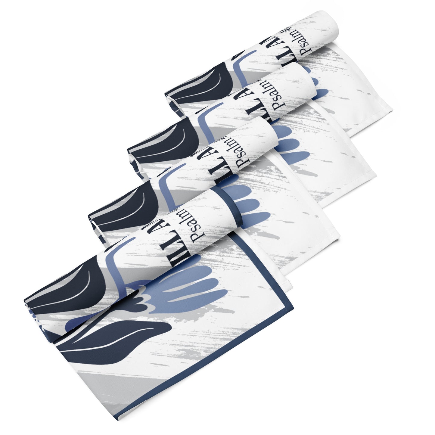 Four rolled Be Still LIWI Cloths with gray pattern and text saying 'Be Still and Know, Psalm 46:10'