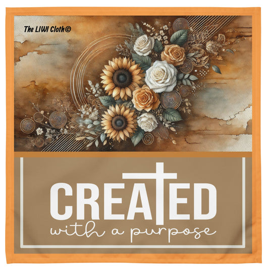Front of LIWI cloth tan, orange, brown, beige floral background with text saying 'Created with a purpose'
