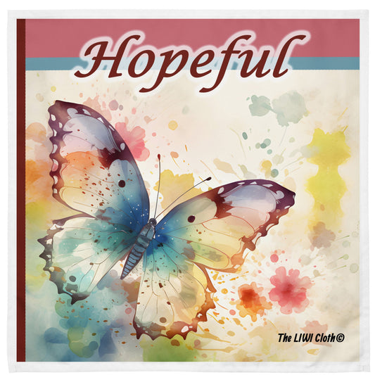 Front of LIWI cloth with colorful butterfly on color splotches and header saying 'Hopeful'