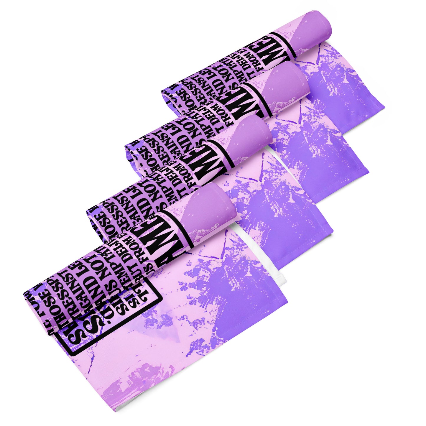 Front of LIWI lap cloth with purple abstract background and image of cross with Lord's prayer inside, four cloth