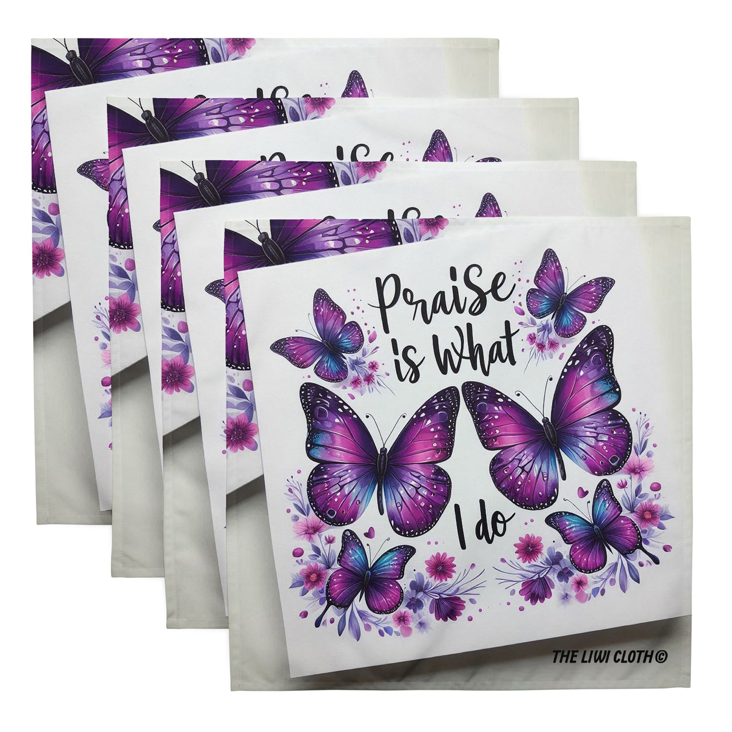 Front of LIWI cloth with purple butterflies and black text saying 'praise is what I do' on a white background, four cloths