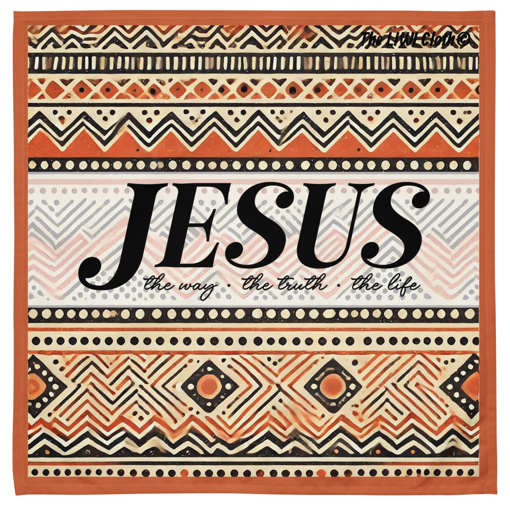 Front of LIWI cloth with orange, beige, black and white pattern text saying 'Jesus the way, the truth, the life'