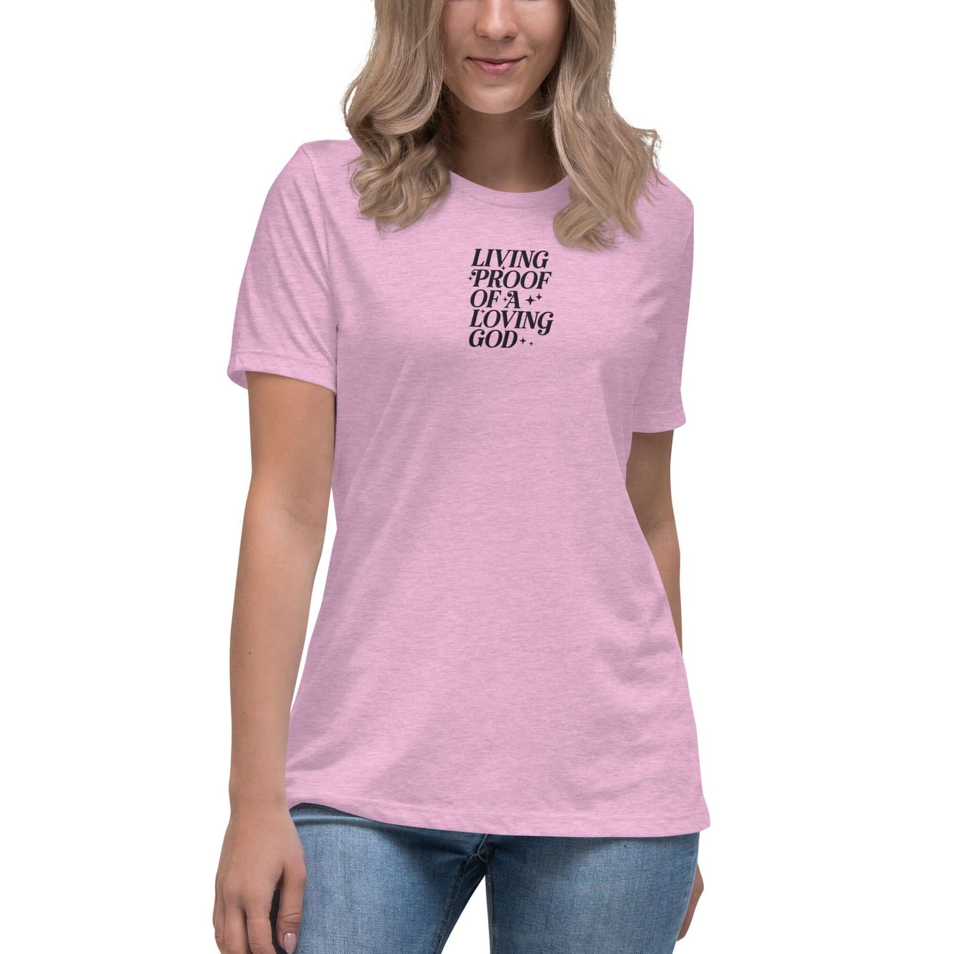 Front of lilac t-shirt with embroidered text saying 'living proof of a loving God'