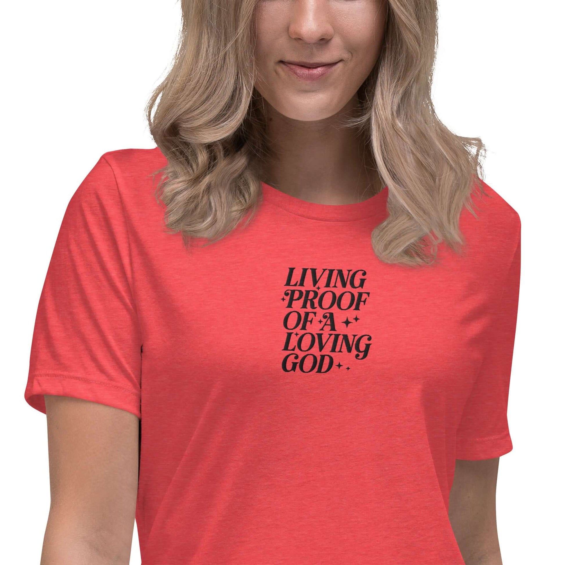 Front of red t-shirt with embroidered text saying 'living proof of a loving God'