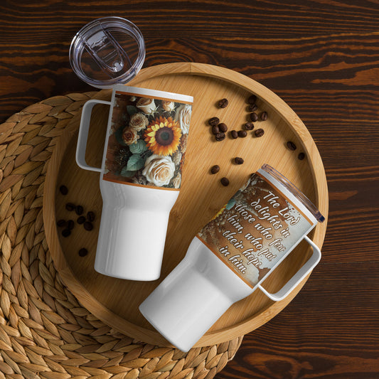 Two 25 oz travel mugs laying in a brown plate, let side showing brown, beige and orange flowers and right mug with Psalm 147:11: the LORD delights in those who fear him, who put their hope in his unfailing love.