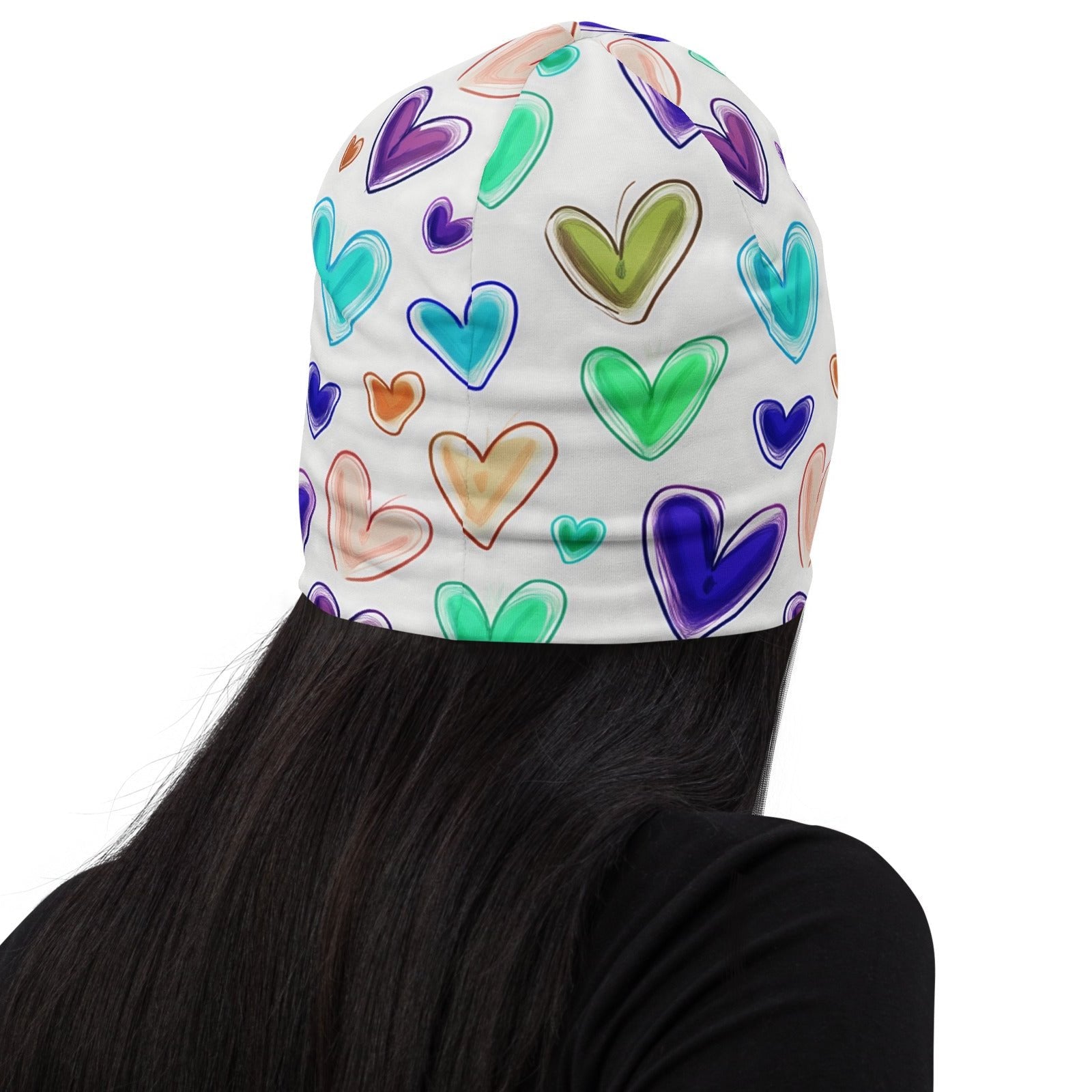 Back of white beanie with multicolored hearts