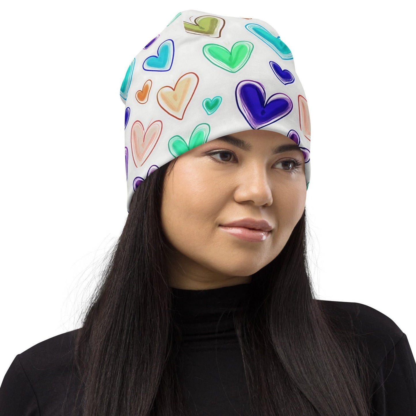 Right front of white beanie with multicolored hearts