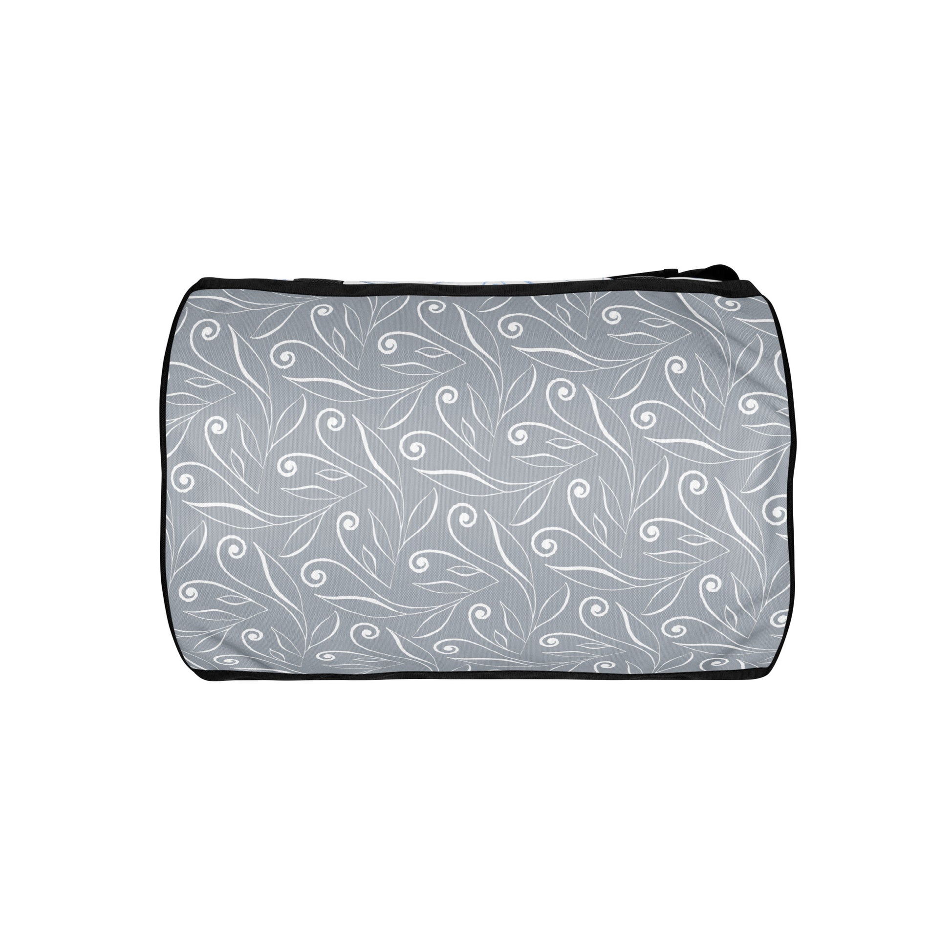 Bottom of light blue gym bag with blue swirl background