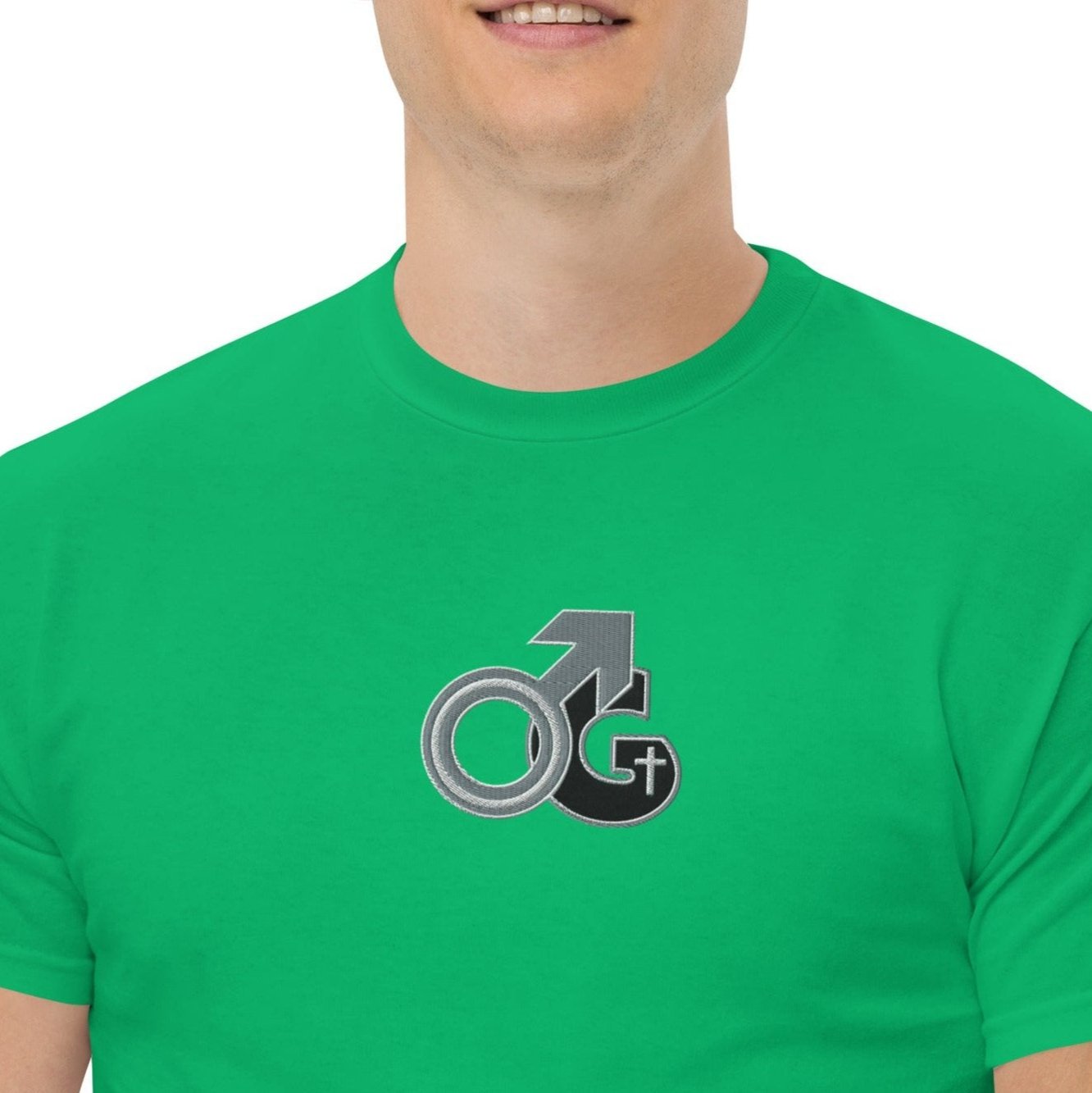 Front of irish green  t-shirt with black, gray and white embroidered symbol representing Man of God