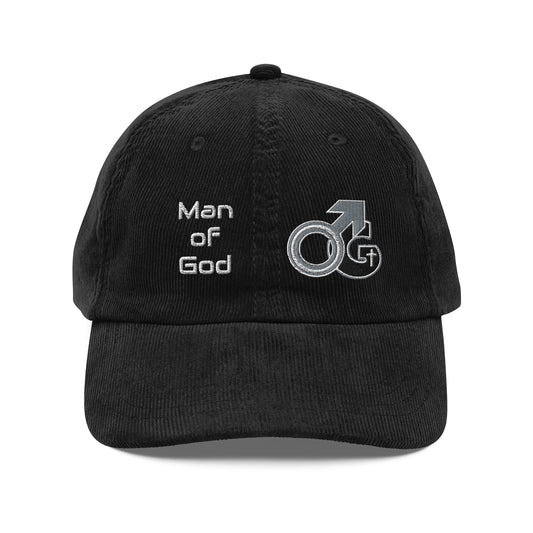 Front view of the black Man of God corduroy cap with black, gray, and white logo on left side and Man of God text on right side
