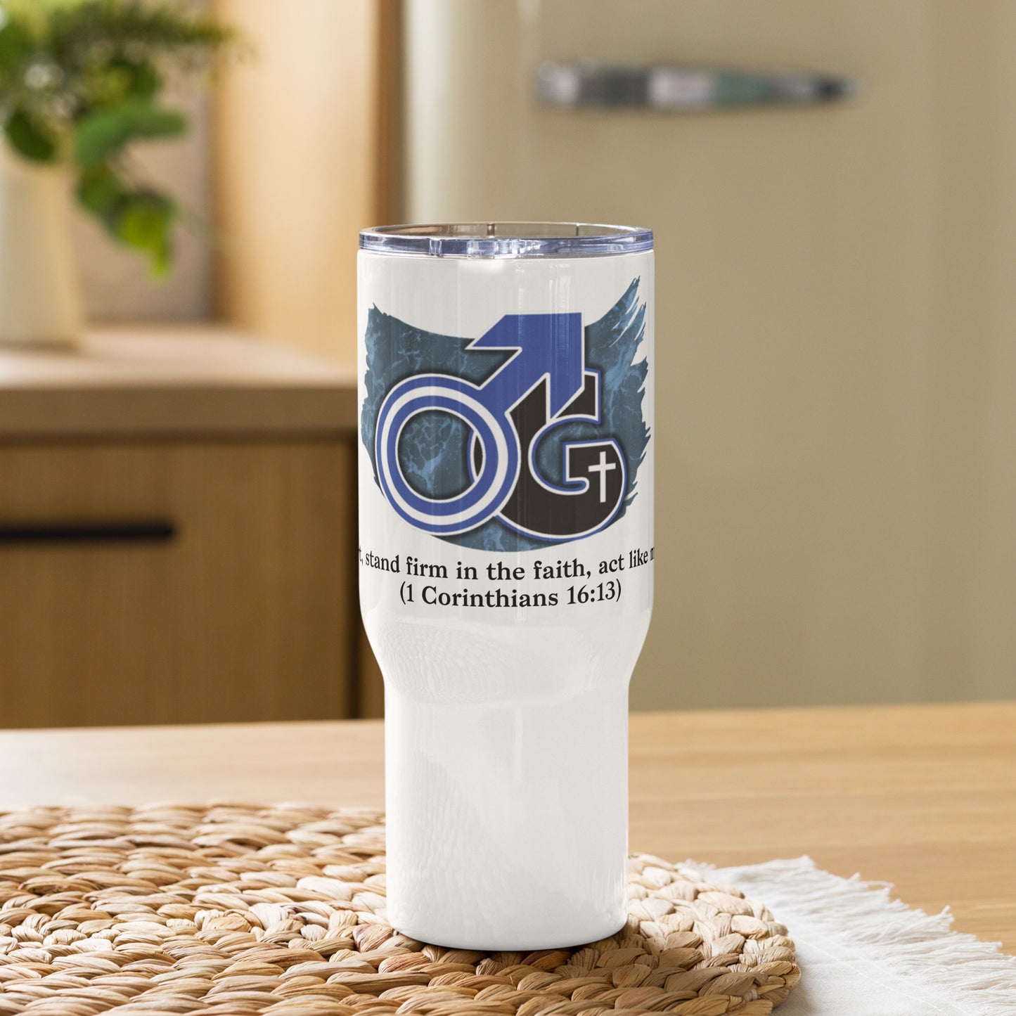 Front view of 25 oz white travel mug with white, blue and black image representing man of God with text from 1 Corinthians 16:13