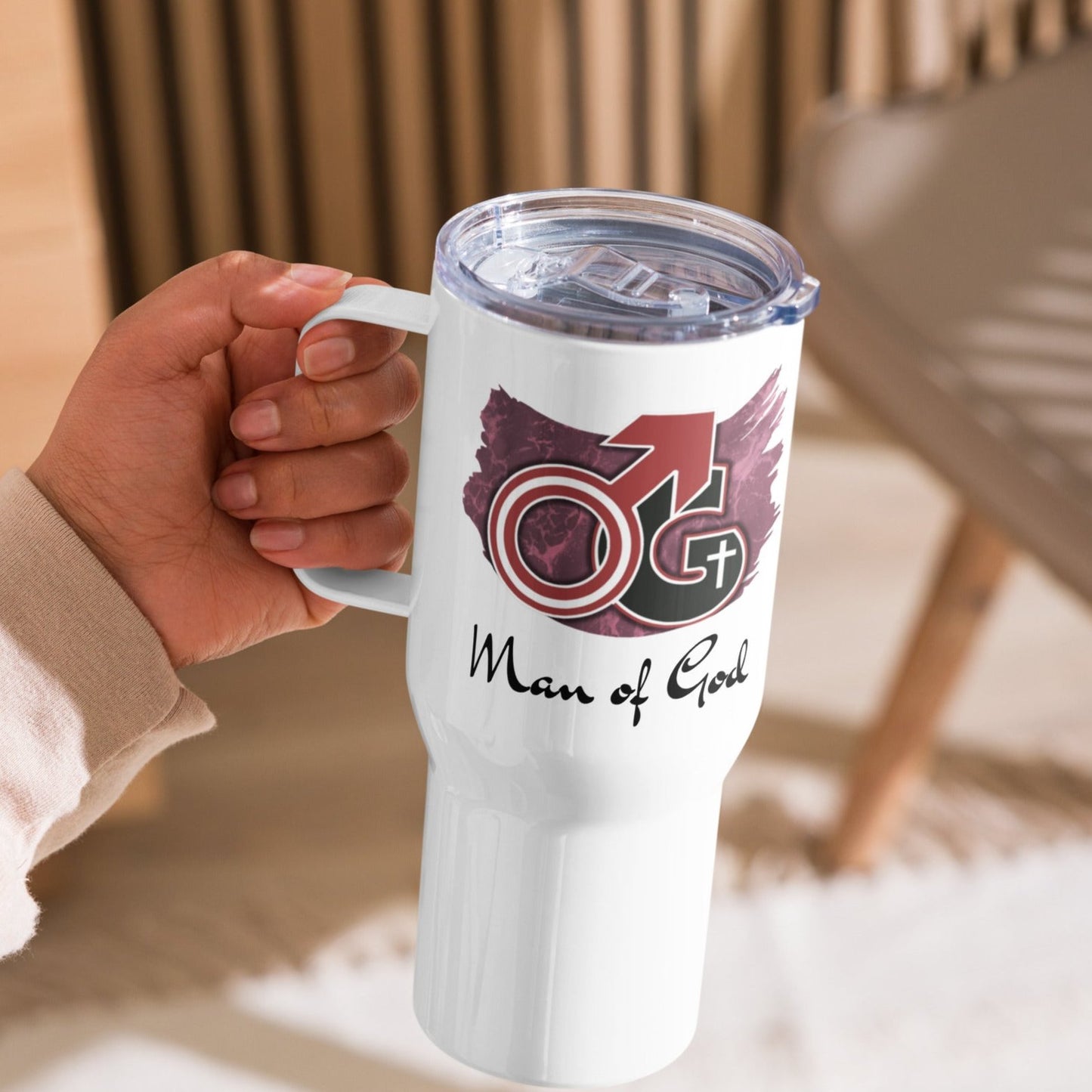 Left view of 25 oz white travel mug with white, burgundy and black image representing Man of God and text saying 'man of God; in black text underneath