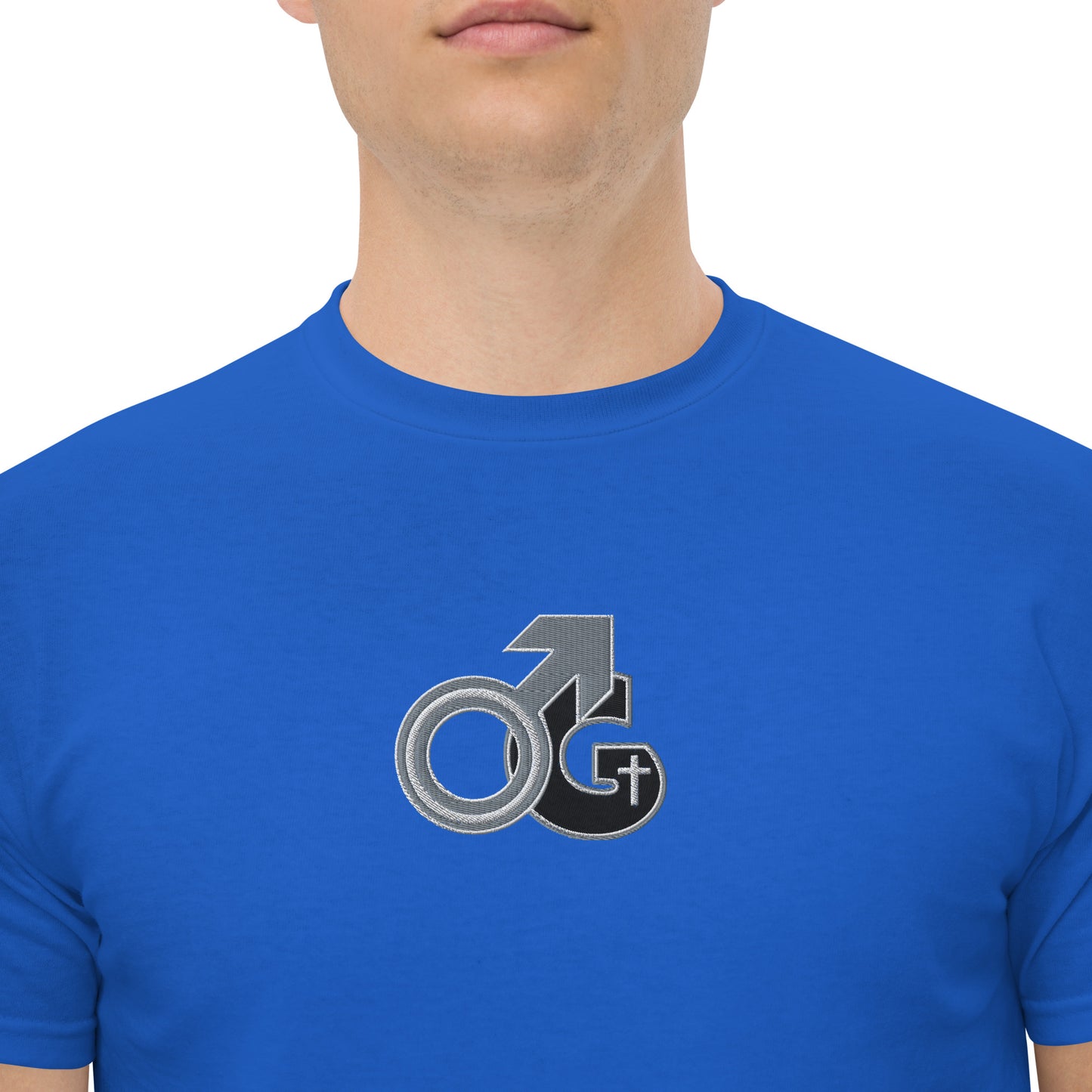 Front of royal t-shirt with black, gray and white embroidered symbol representing Man of God