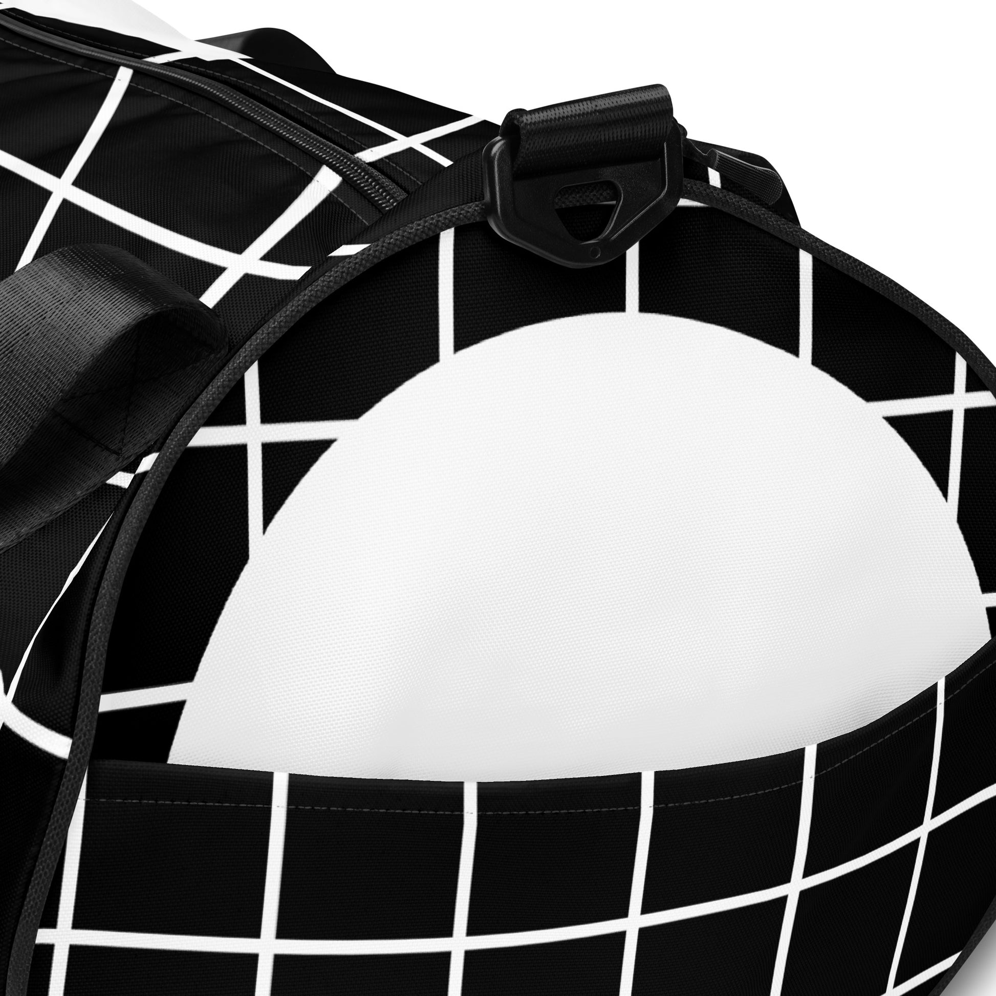 Details of black and white print gym bag with black mandala 