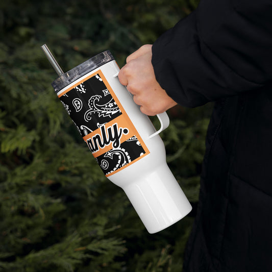 Left of travel mug with black and white paisley and word 'manly' on top of orange banner being held