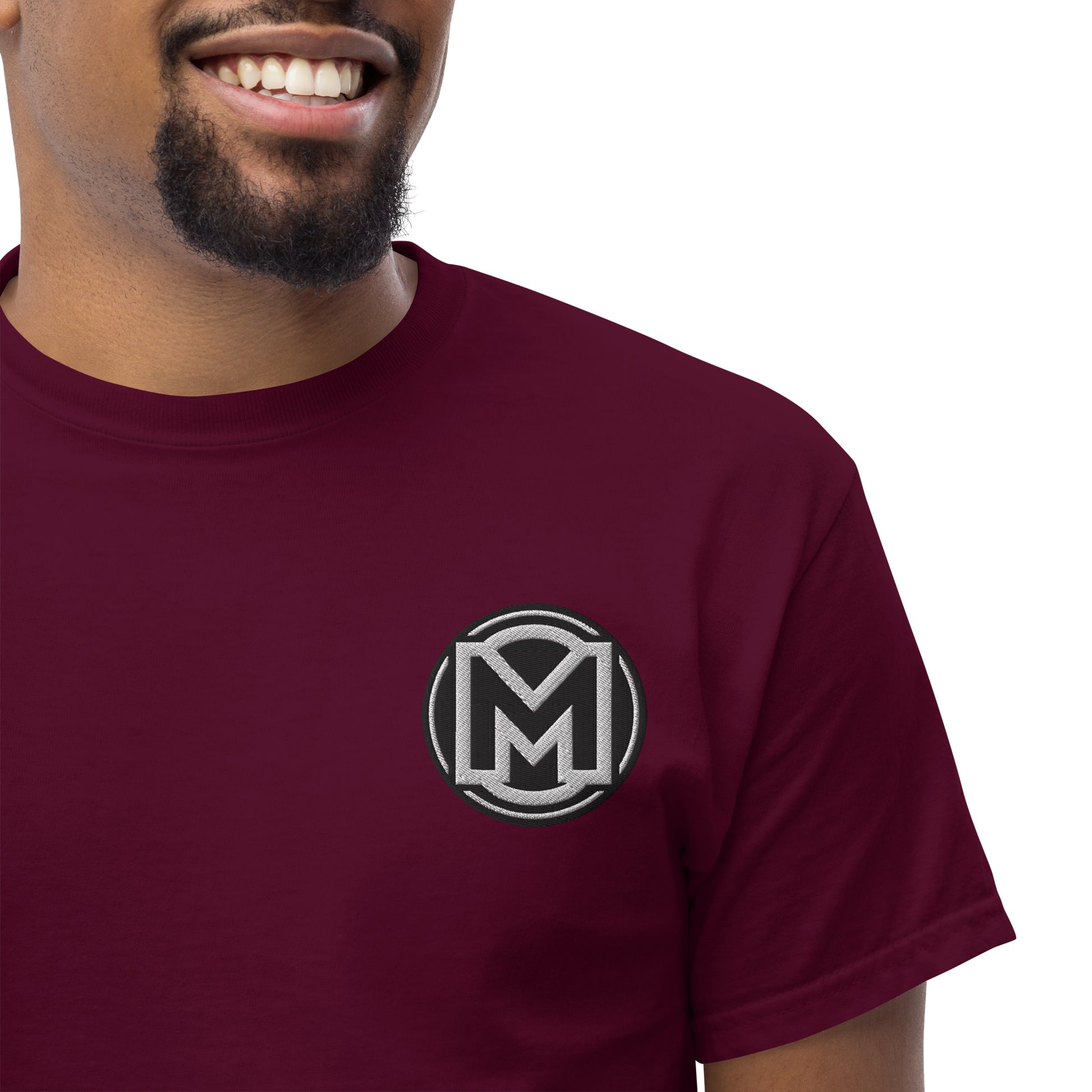 Front of maroon Manly t-shirt with M logo on left chest