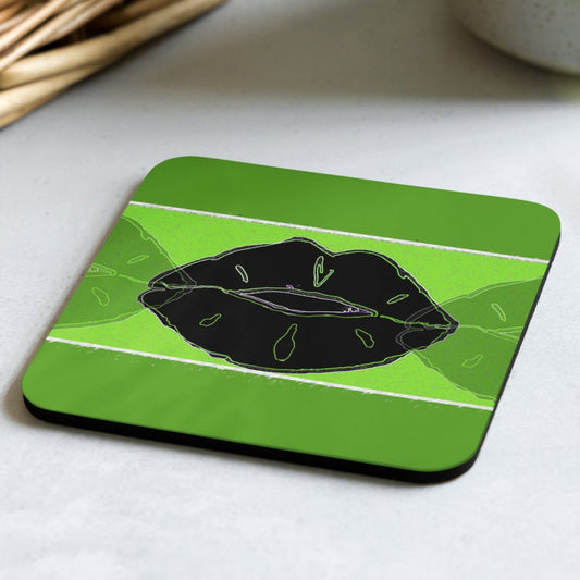 Cork back coaster with a green background and green hued middle banner with an image of a left half of a green lip, a full black lip, and right half of a green lip