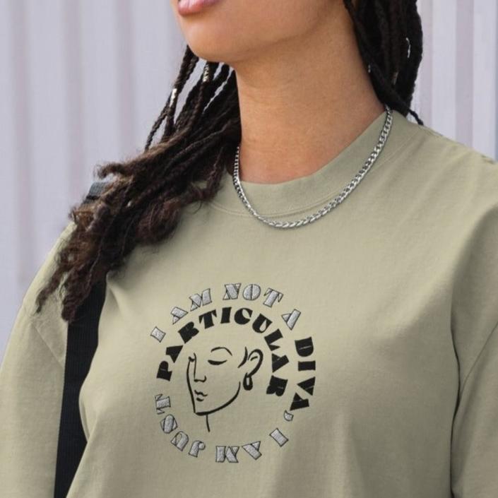 Front of eucalyptus t-shirt  text with image of woman's face and saying 'I am not a diva, I am just particular'