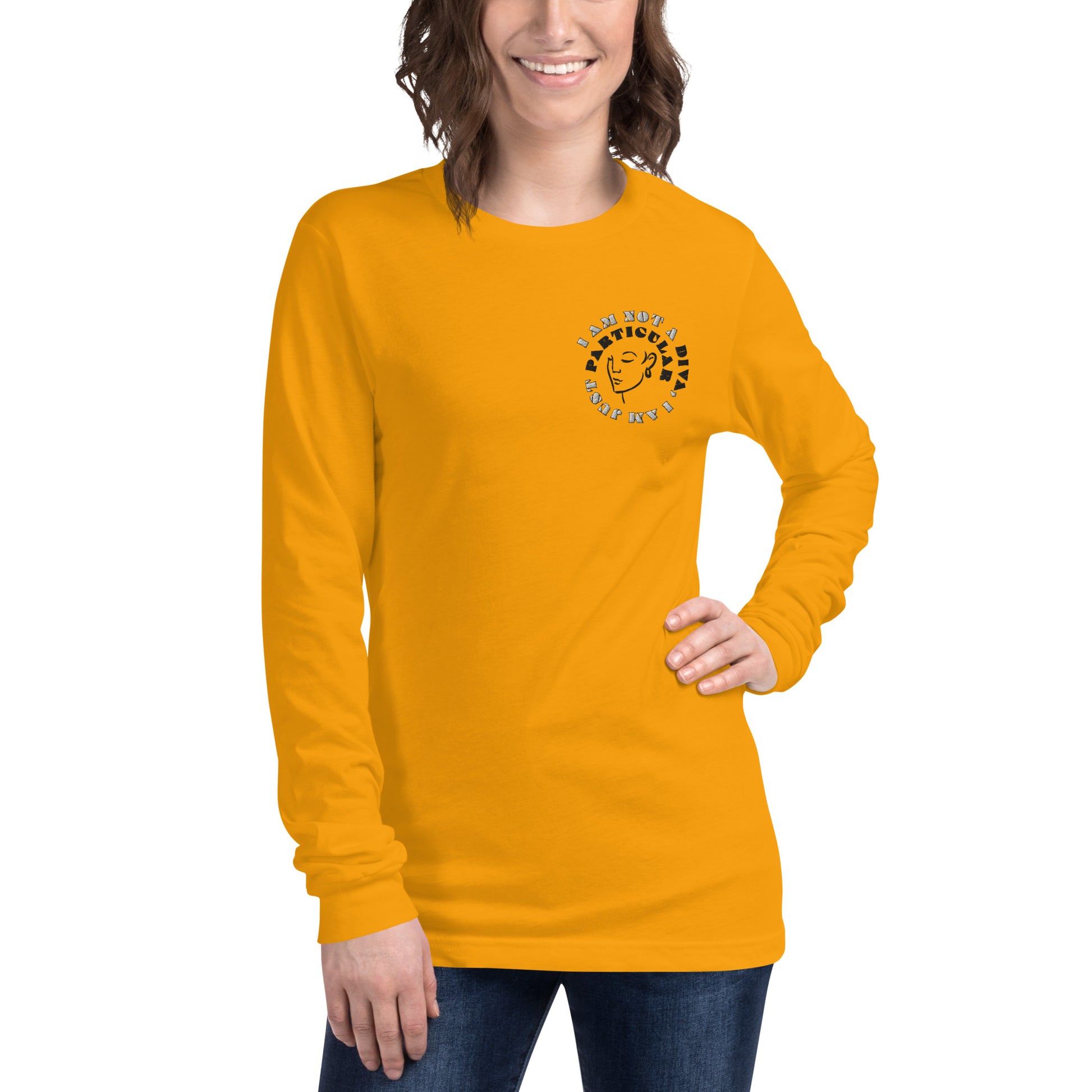 Front of gold long sleeved t-shirt with image of woman's face and text saying 'I am not a diva, I am just particular'