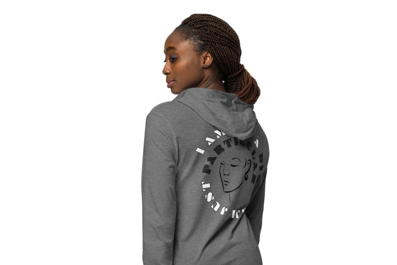 Back of grey hoodie tee with black image of woman's face encircled by black and white text saying 'I am not a diva, I am just particular'