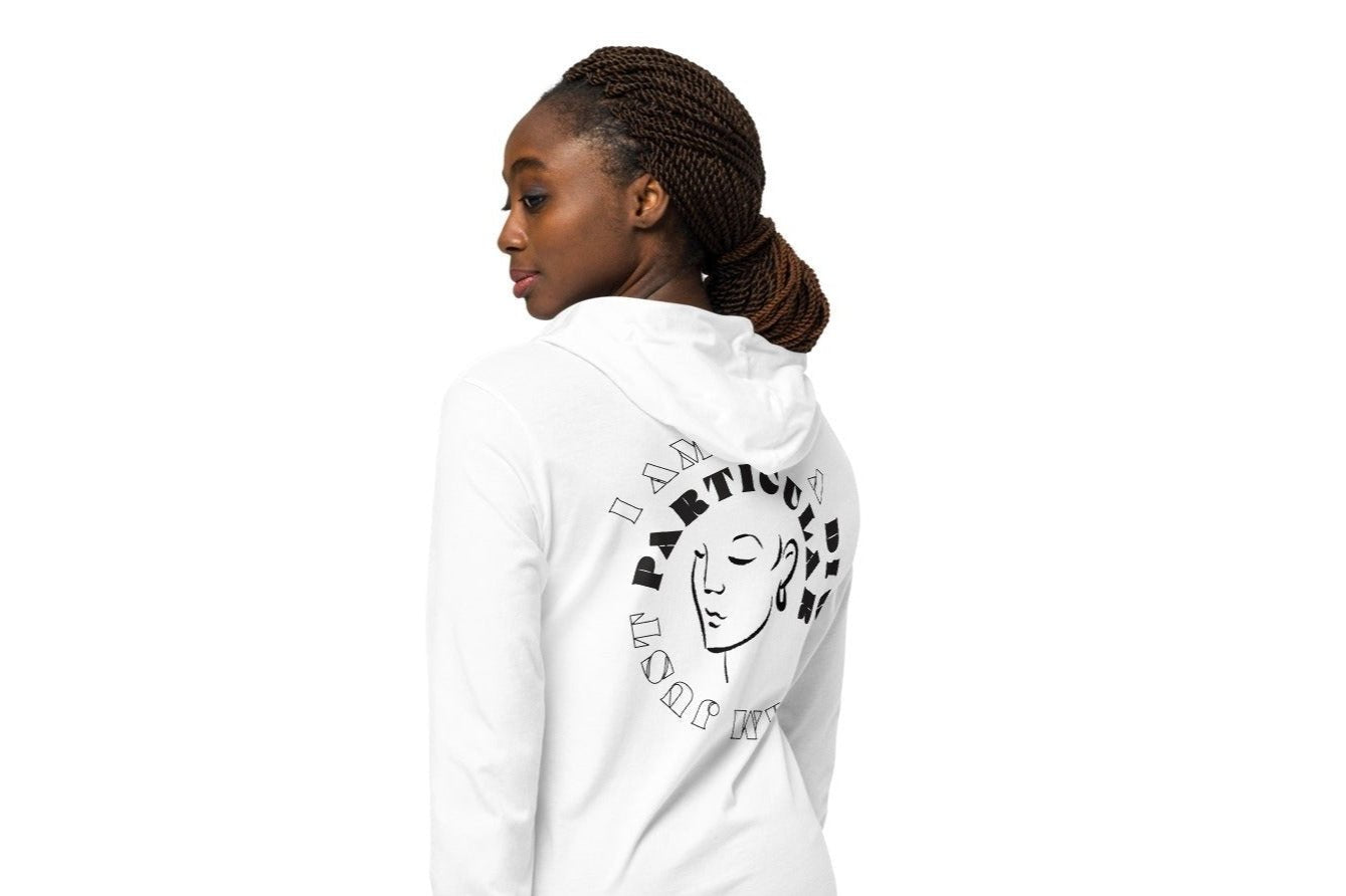 Back of white hoodie tee with black image of woman's face encircled by black and white text saying 'I am not a diva, I am just particular'