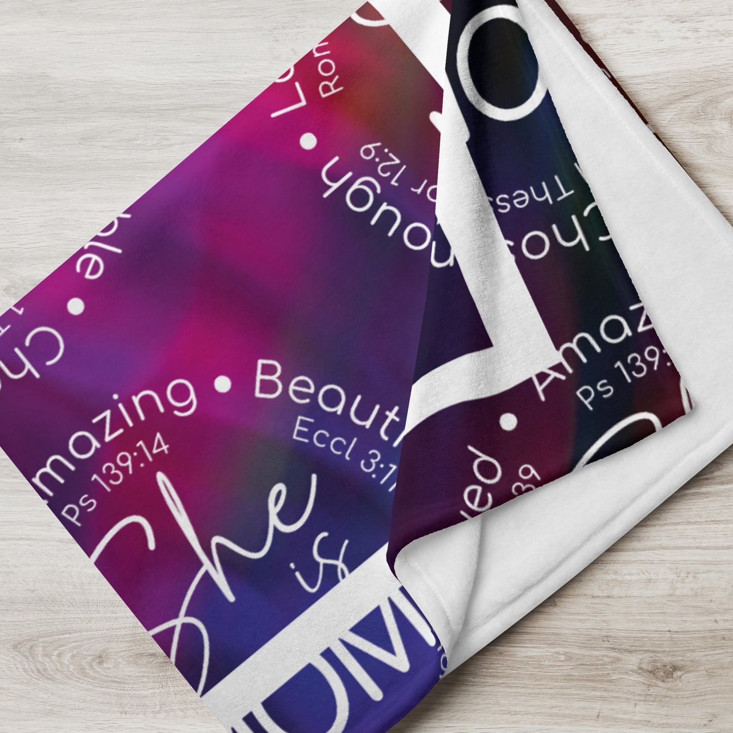 Throw blanket 50x60 with message 'She is Mom" in purple folded