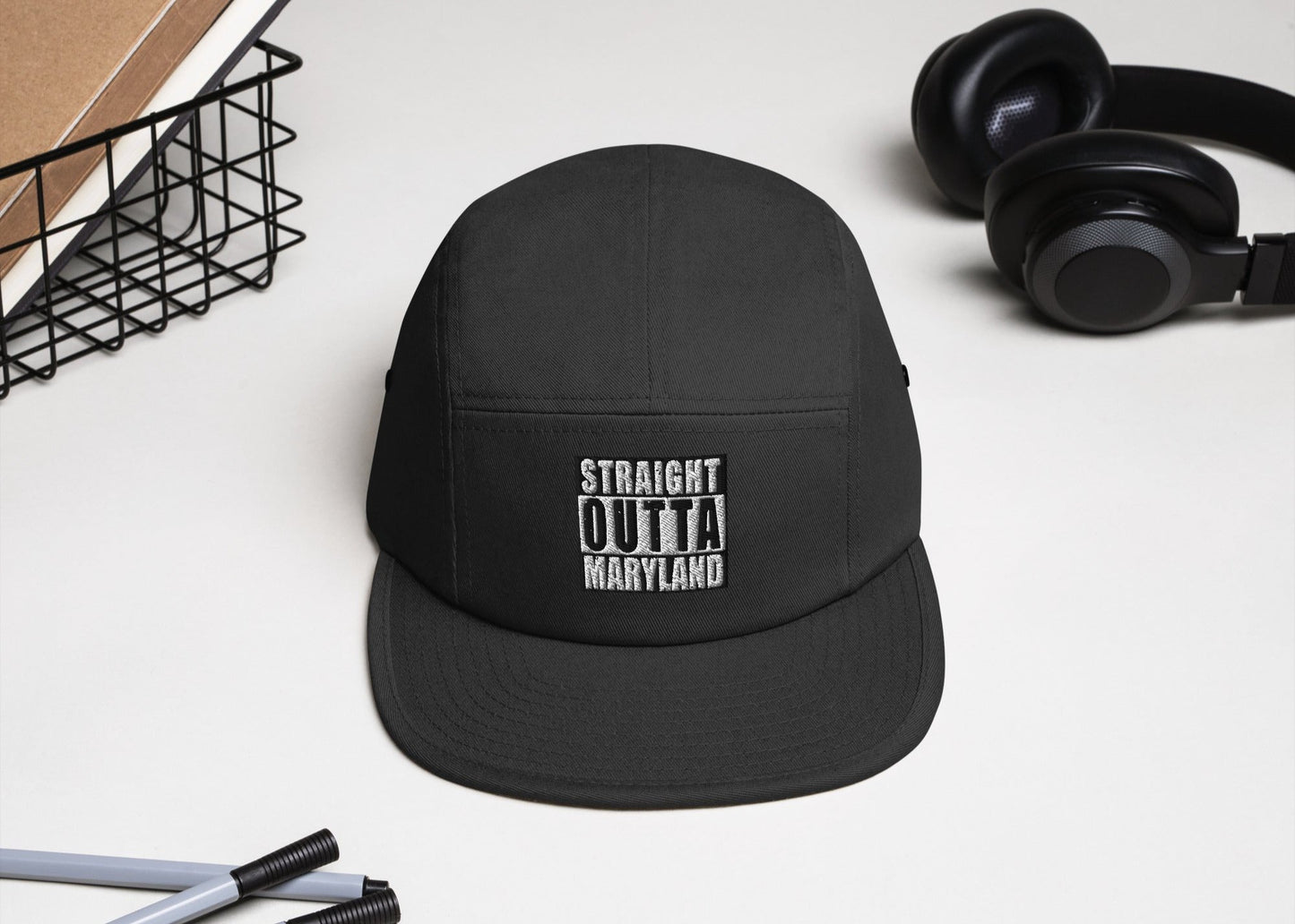 Front 5-panel black unisex cap with embroidered text saying 'Straight Outta Maryland'