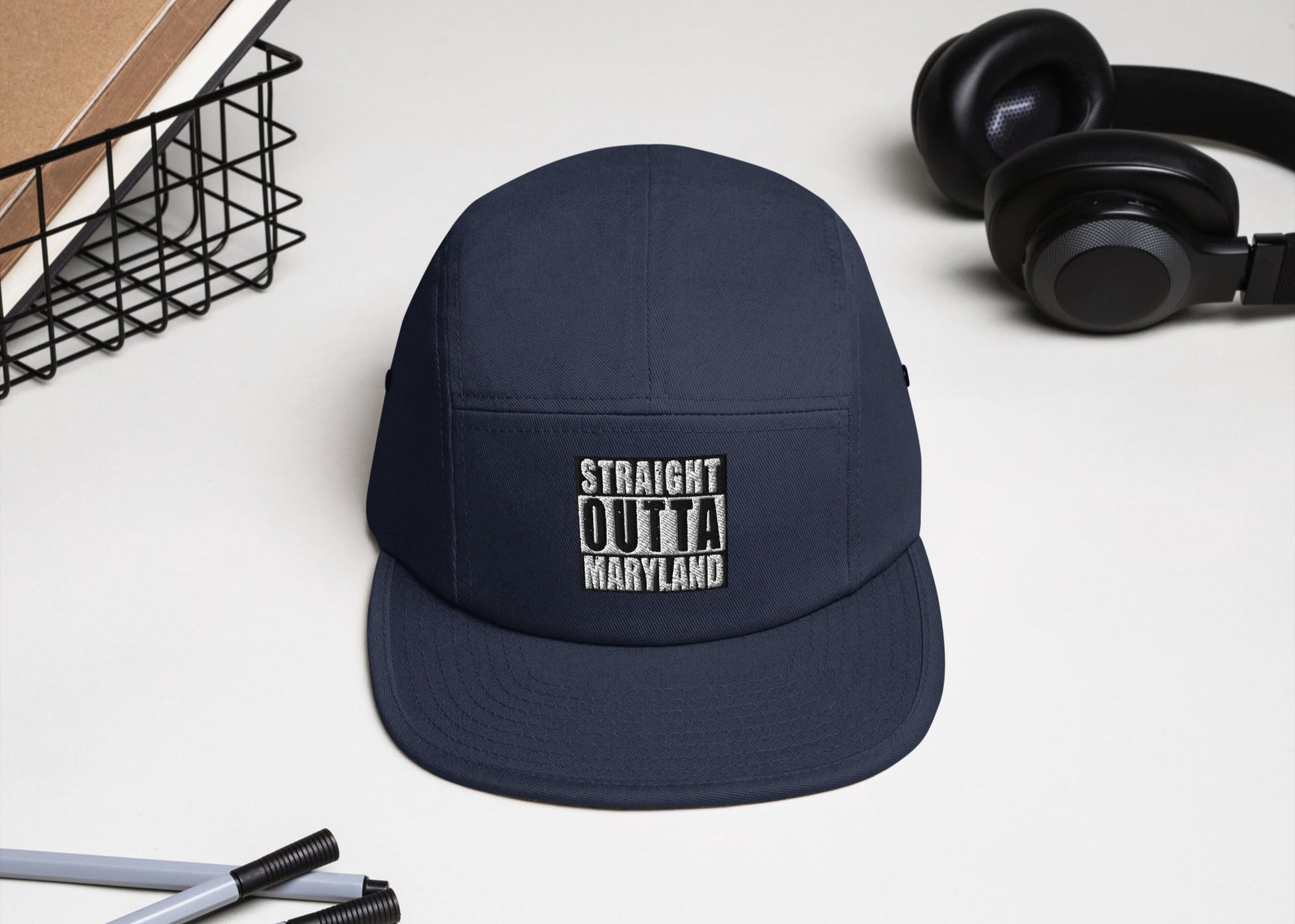 Front 5-panel navy unisex cap with embroidered text saying 'Straight Outta Maryland'