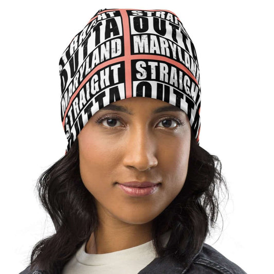 Front of beanie with rose background and black and white patterned text saying 'Straight Outta Maryland'