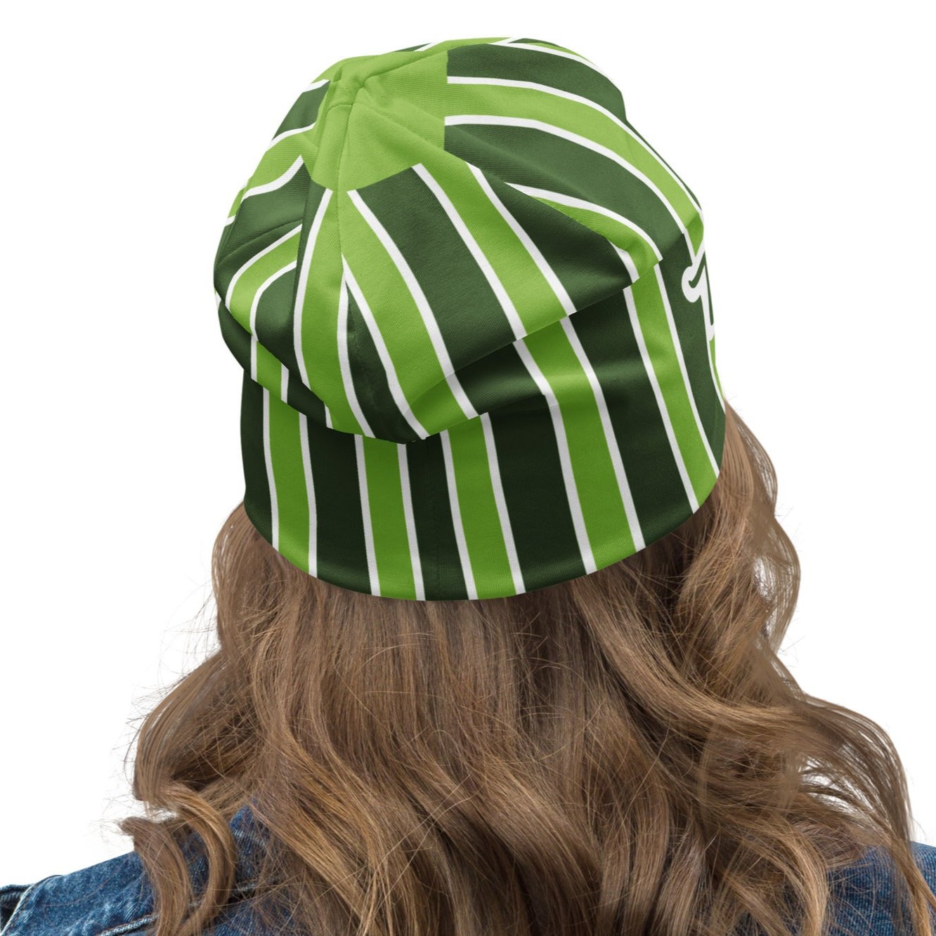 Back of green striped beanie with green beanie