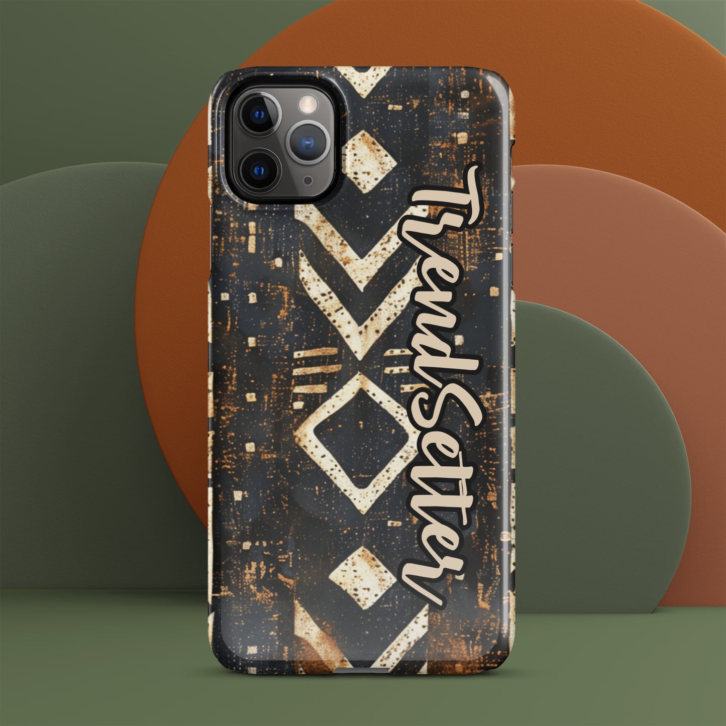 Front of iPhone 11 pro max case with black African print and words 'TrendSetter'