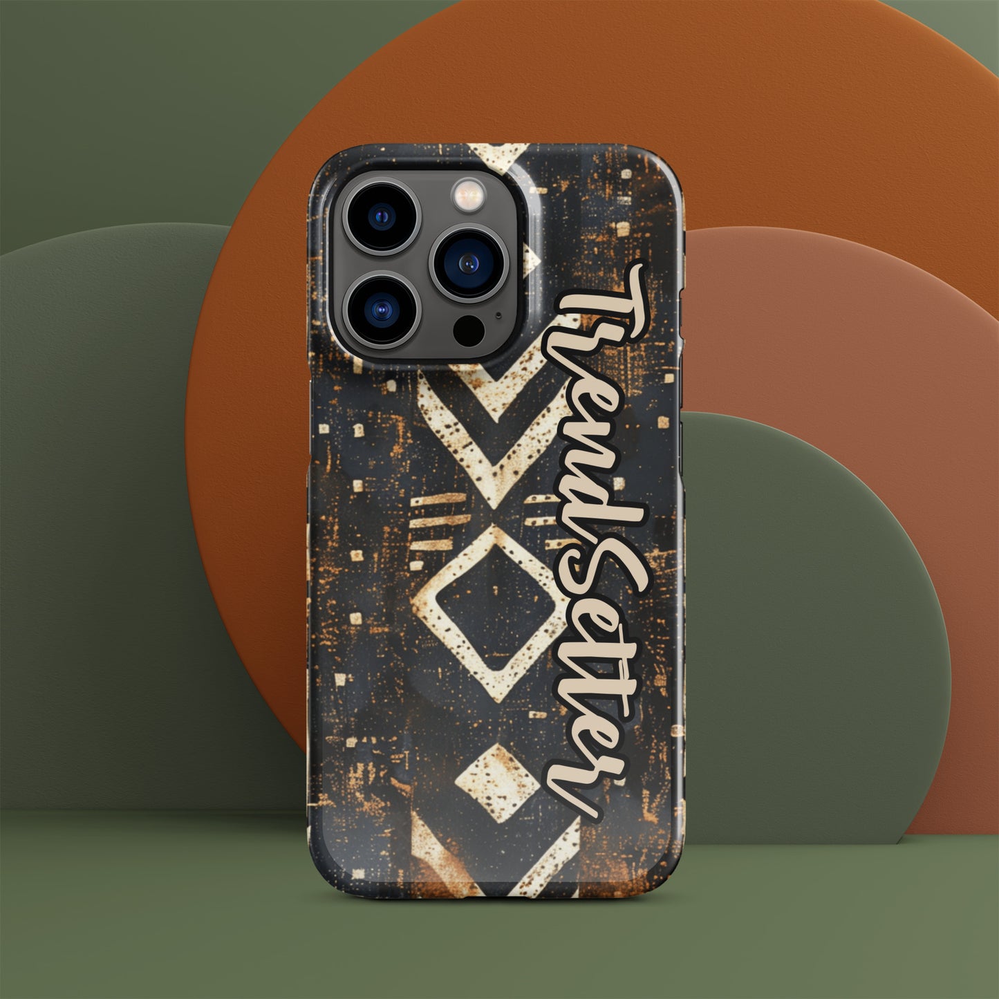 Front of iPhone 13 pro case with black African print and words 'TrendSetter'