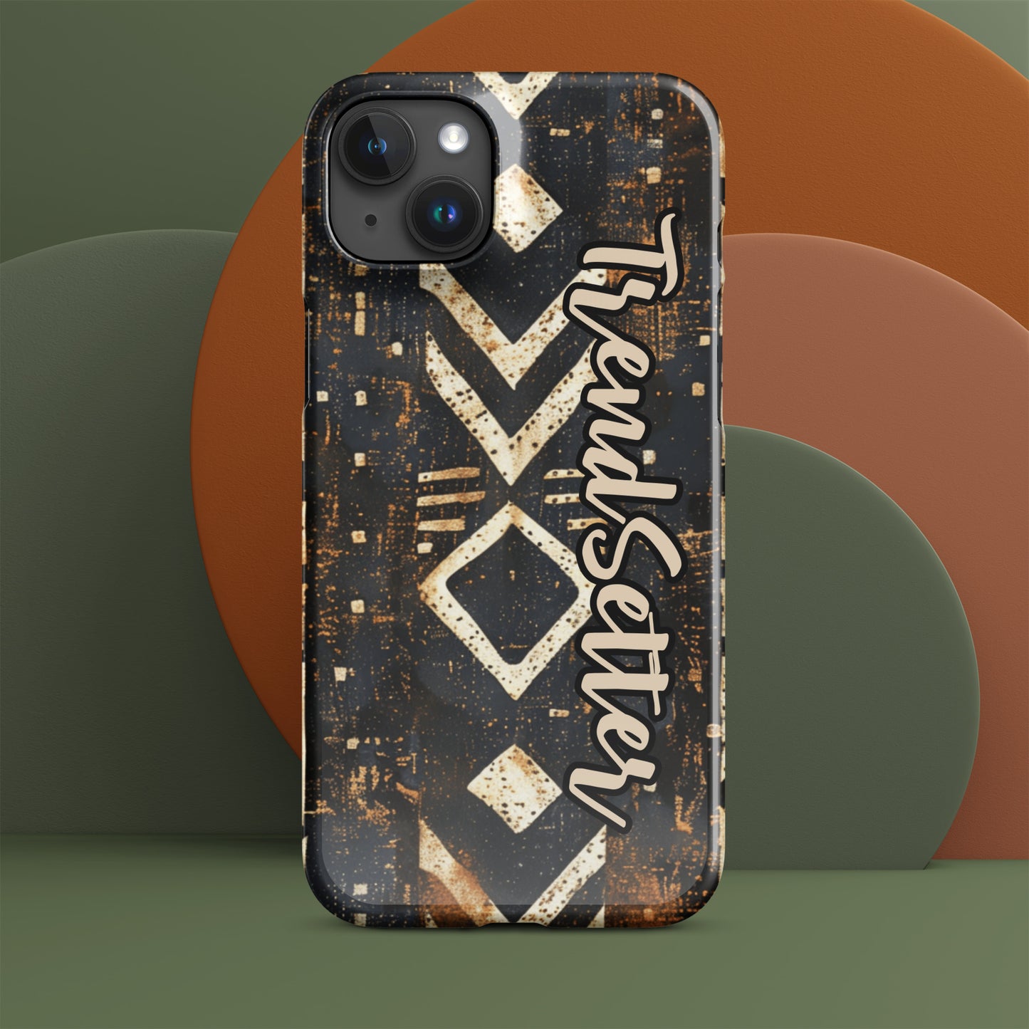 Front of iPhone 15 plus case with black African print and words 'TrendSetter'