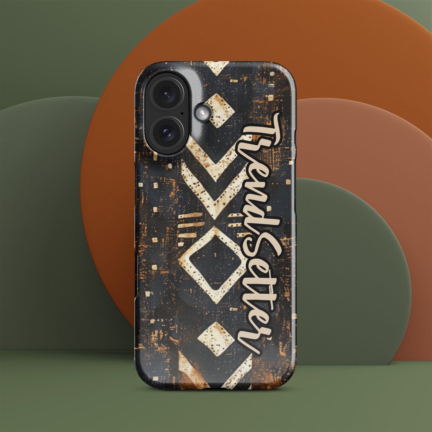 Front of iPhone 16 case with black African print and words 'TrendSetter'