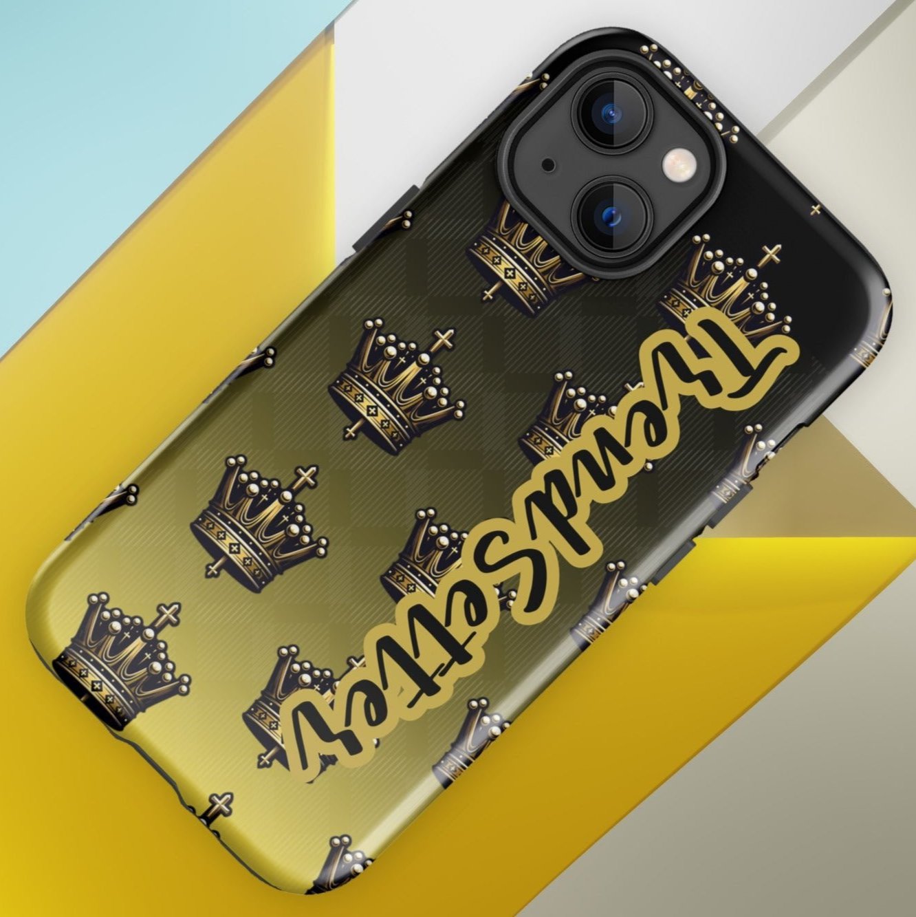 Front of 13 iPhone case with black and gold background with crowns and gold and black text saying 'TrendSetter'