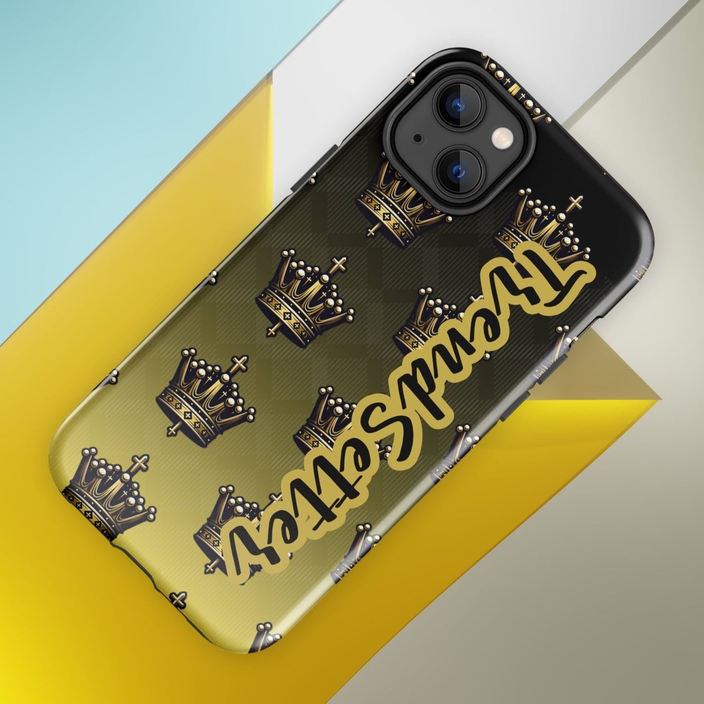 Front of 14 iPhone case with black and gold background with crowns and gold and black text saying 'TrendSetter'