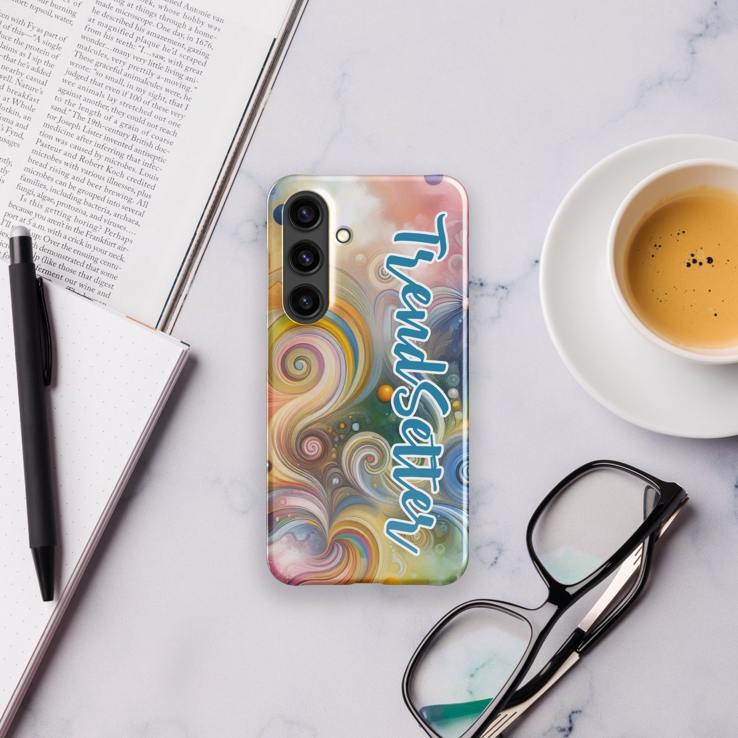 Front of s24 Samsung case with multi-colored swirls and blue and white text saying 'TrendSetter'