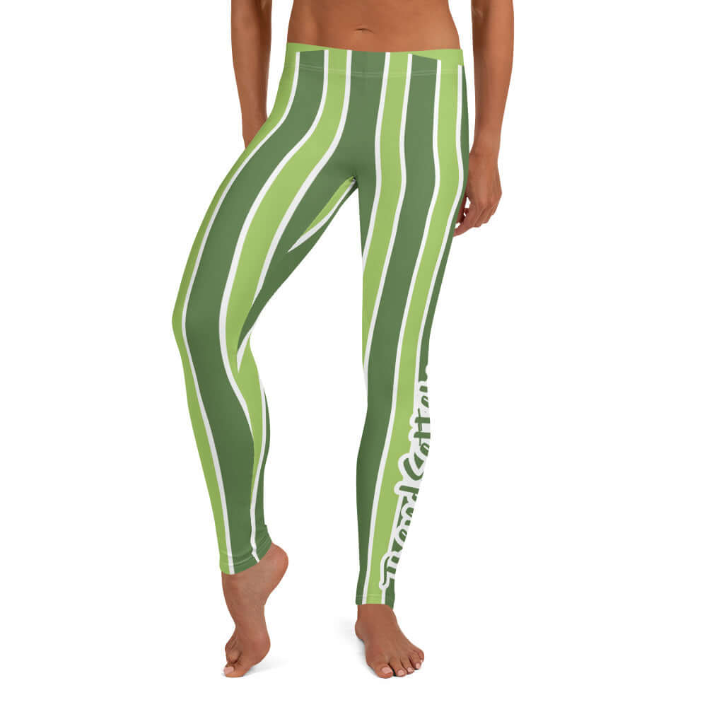 Front of green and white lined leggings with green and white text saying 'TrendSetter' on left calf