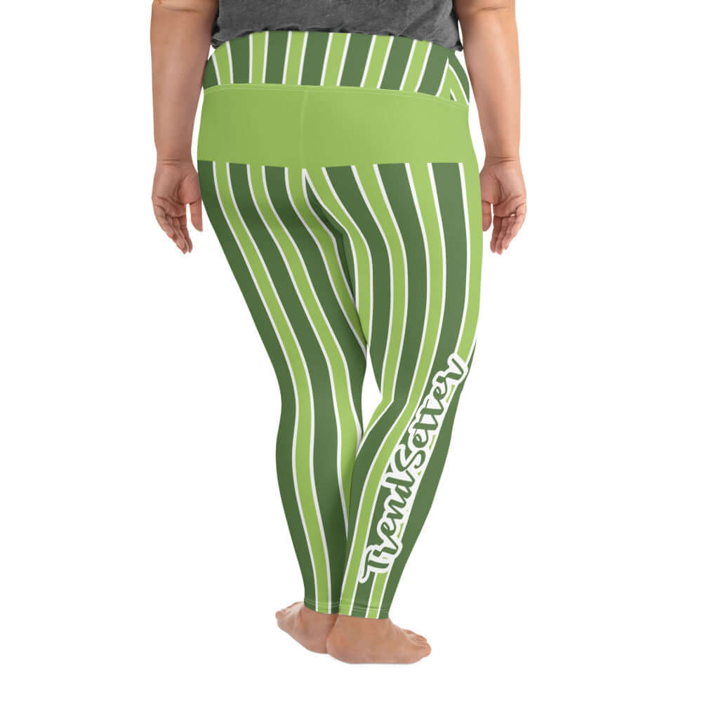 Back of green and white lined leggings with green and white text saying 'TrendSetter' on right calf