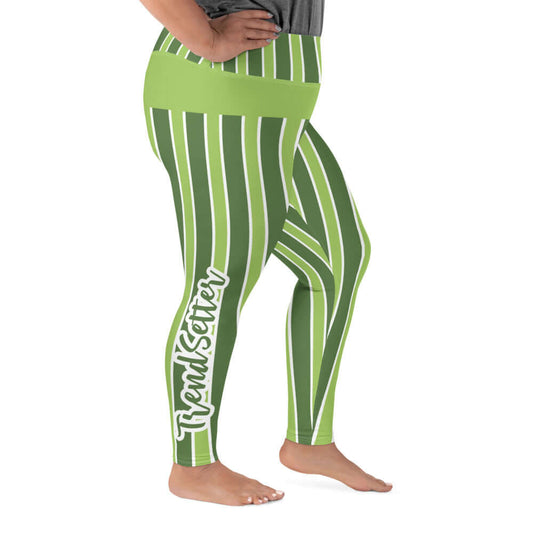 Right of green and white lined leggings with green and white text saying 'TrendSetter' on right calf