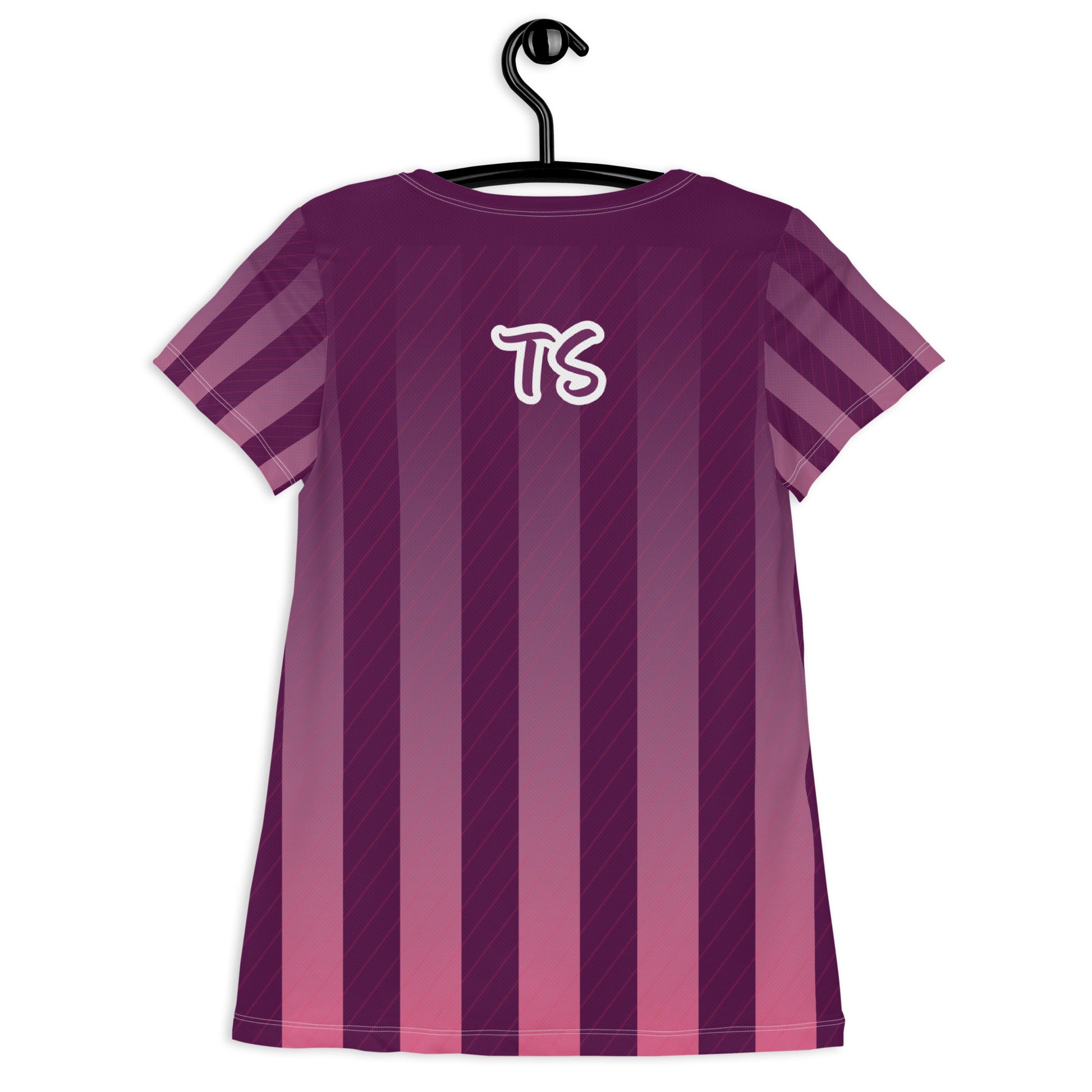 Back of purple and white t-shirt and purple and white text saying 'TS'