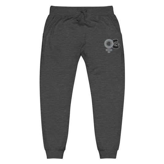 Front of charcoal sweatpants with embroidered symbol for woman of God on front, left thigh