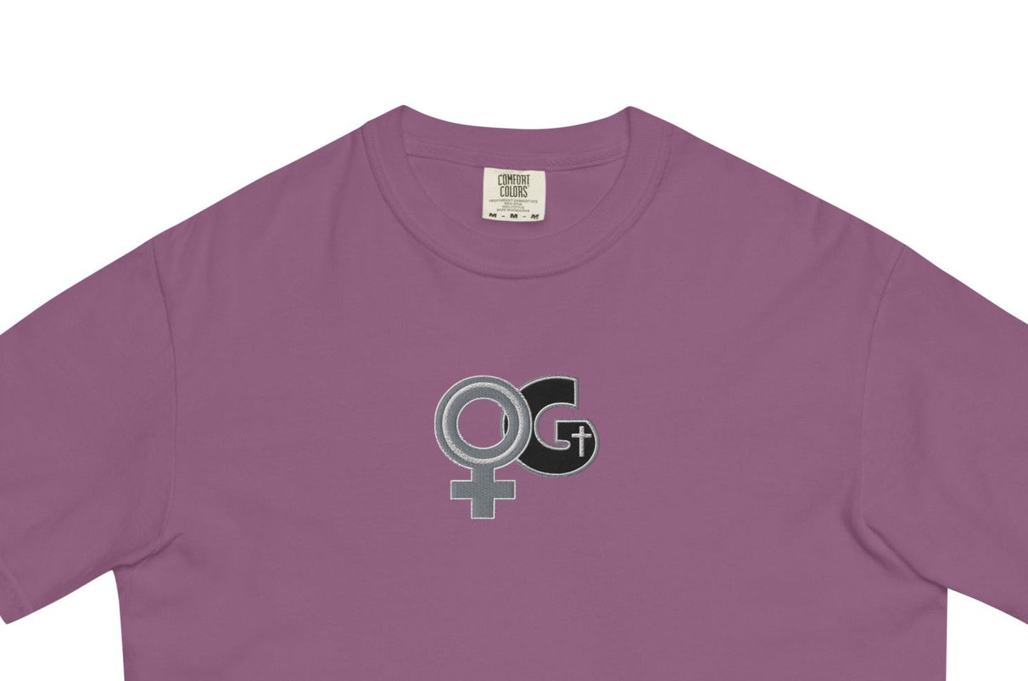 Front of berry t-shirt with embroidered black and grey woman of God symbol