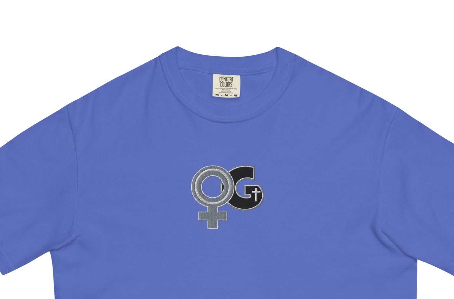 Front of flo-blue t-shirt with embroidered black and grey  Woman of God symbol